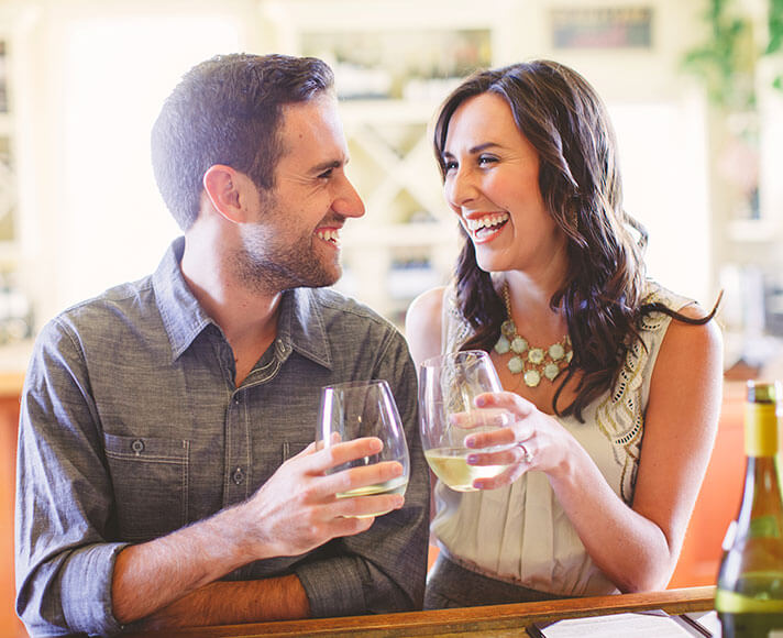 A couple enjoys wine tasting in San Luis Obispo, CA