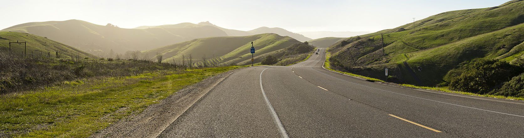 Road through the rolling green hills of San Luis Obispo County