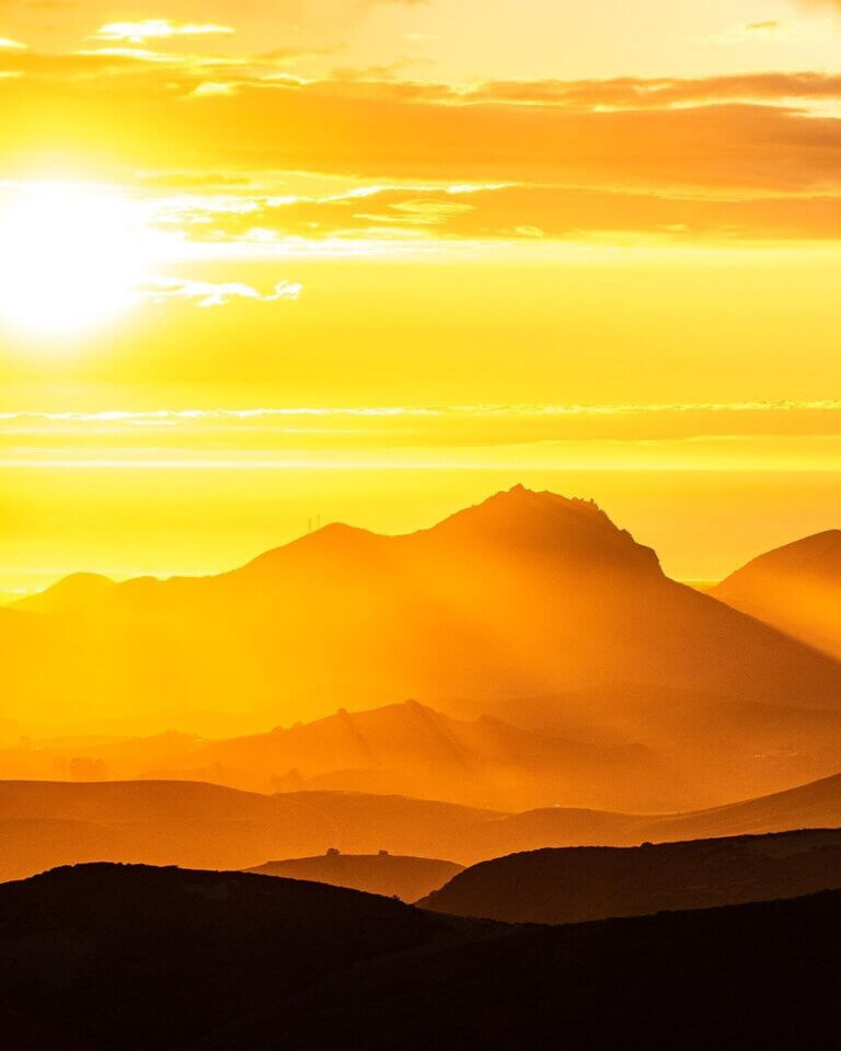 sunset over the hills of morro bay