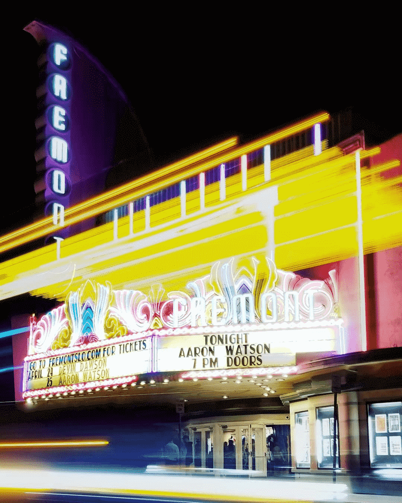 The Fremont Theater exterior with colorful light effects. Photo by @powlpow